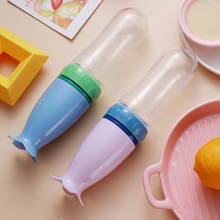 Title: Silicone Baby Feeding Spoon Bottle