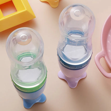 Title: Silicone Baby Feeding Spoon Bottle